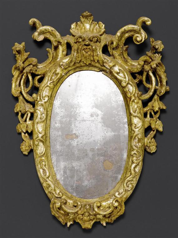 Appraisal: OVAL MIRROR Baroque Veneto circa Carved and silvered wood H