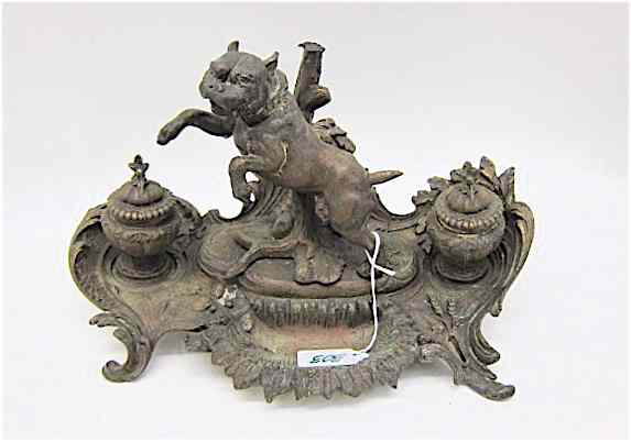 Appraisal: GERMAN PATINATED METAL FIGURAL DESK SET centered with bull dog