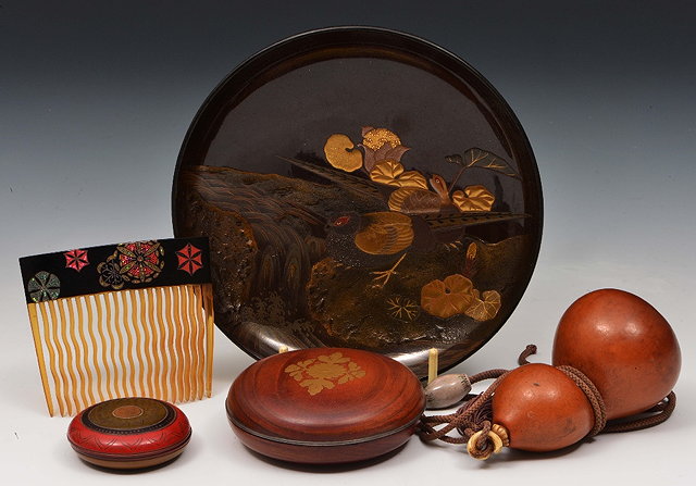 Appraisal: A Japanese grained wood kogo th Centurydecorated kiku flowers and