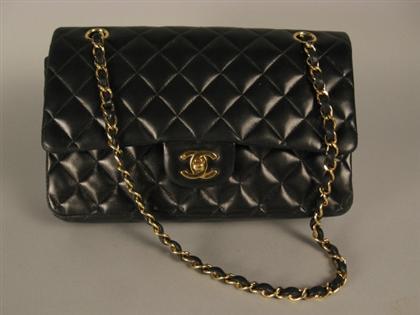 Appraisal: Classic Chanel quilted purse Soft black kidskin front-flap logo-latch purse