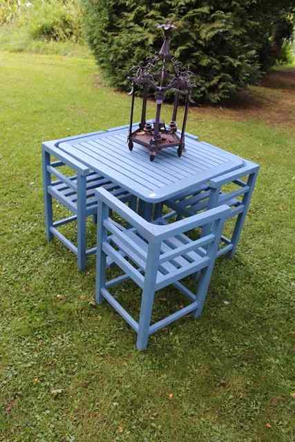 Appraisal: A HEALS STYLE BLUE PAINTED SQUARE GARDEN TABLE and four