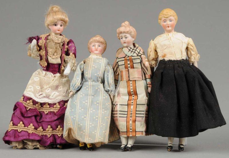 Appraisal: Lot Four Antique Dollhouse Ladies Germany ca an assortment of