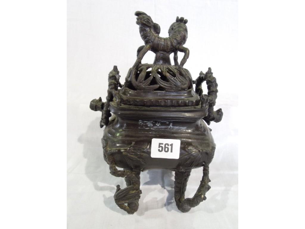 Appraisal: A Chinese Koro incense burner with mystical creature to the