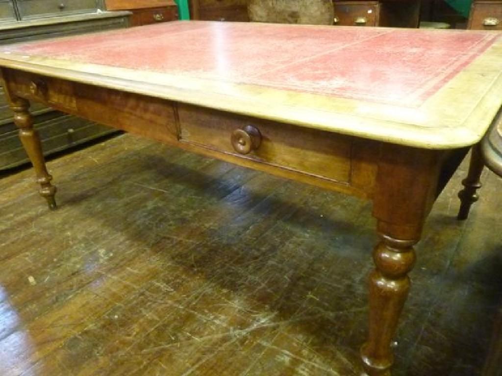 Appraisal: A Victorian satinwood library table the rectangular top with moulded