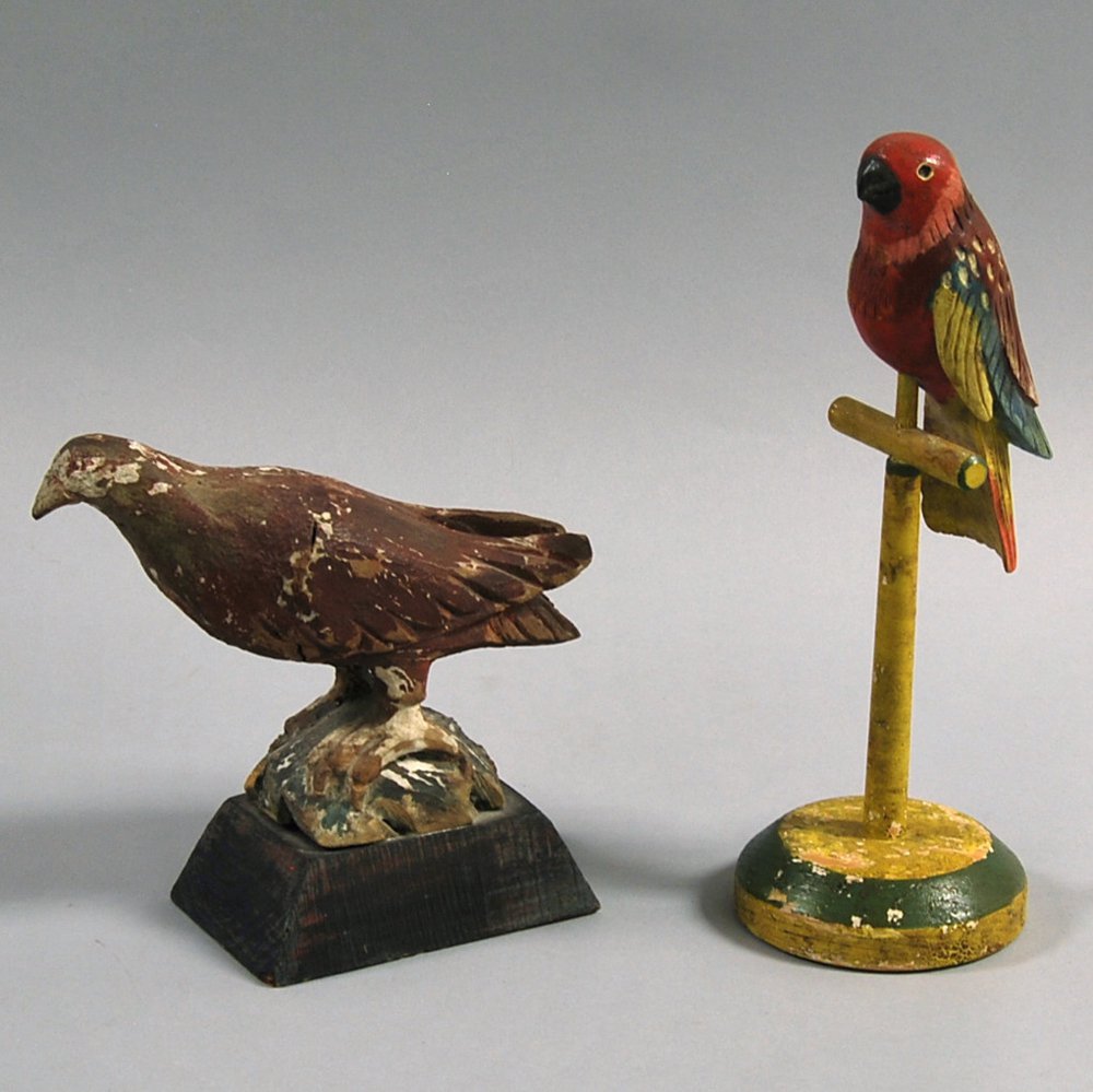 Appraisal: Two Carved and Painted Folk Art Birds th th century