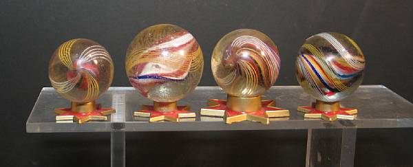 Appraisal: Grouping of Solid Core Swirl Marbles Sizes range from fair