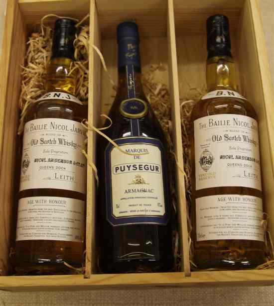 Appraisal: Seven bottles of brandy and whisky including one Duboigalant XO