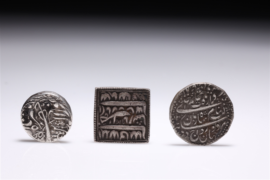 Appraisal: Group of three antique Indian silver metal coins th century