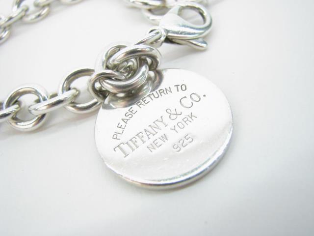 Appraisal: Tiffany Co Return to Tiffany round tag charm bracelet in