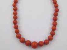 Appraisal: A graduated coral bead necklace approx cm long the beads