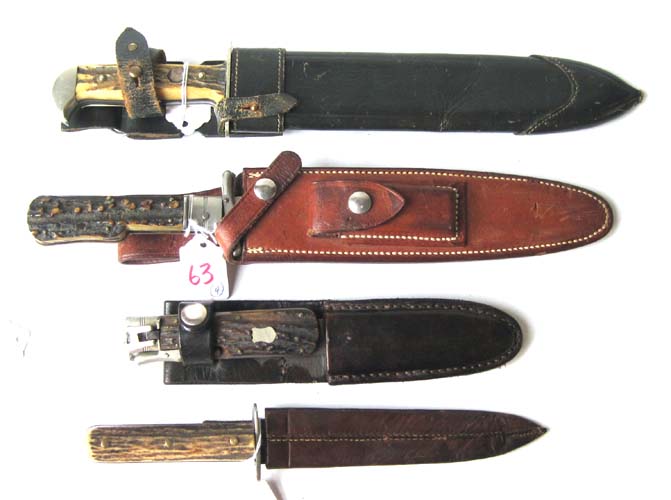 Appraisal: FOUR STAG HANDLED KNIVES WITH SHEATHS Puma-Werk Soligen heavy blade