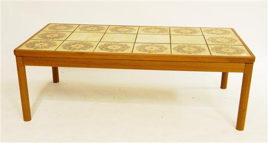 Appraisal: Danish coffee table with inlaid orange and blue flower burst