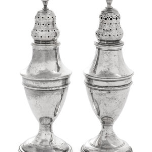 Appraisal: A Near Pair of George III Silver Casters George Smith