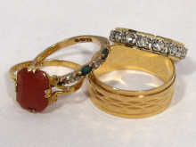 Appraisal: A mixed lot comprising four carat gold stone set rings