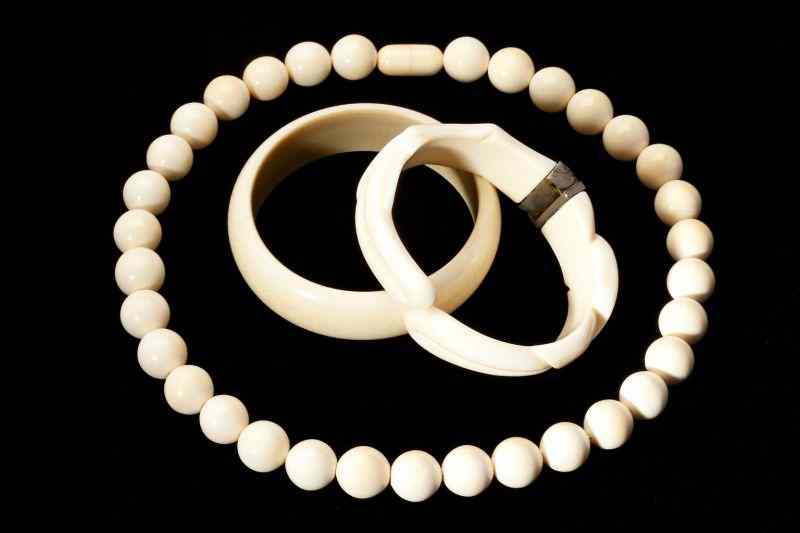 Appraisal: Two Ivory Bracelets and Necklacethe first a hinged and carved