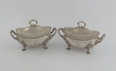 Appraisal: A pair of George III bellied oval sauce tureens with