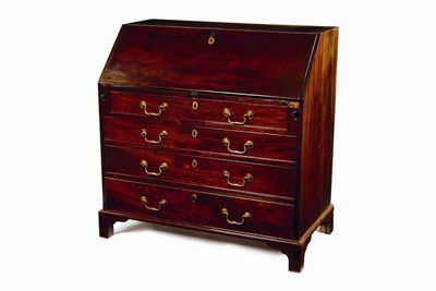 Appraisal: A George III mahogany bureau the hinged fall revealing drawers