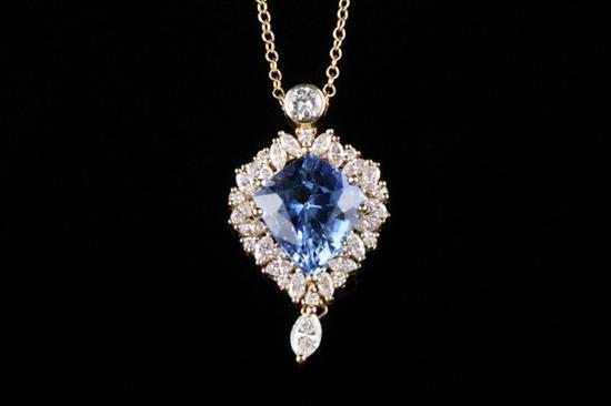 Appraisal: K YELLOW GOLD CEYLON BLUE SAPPHIRE AND DIAMOND DROP PENDANT