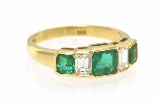 Appraisal: An Karat Yellow Gold Emerald and Diamond Ring containing one