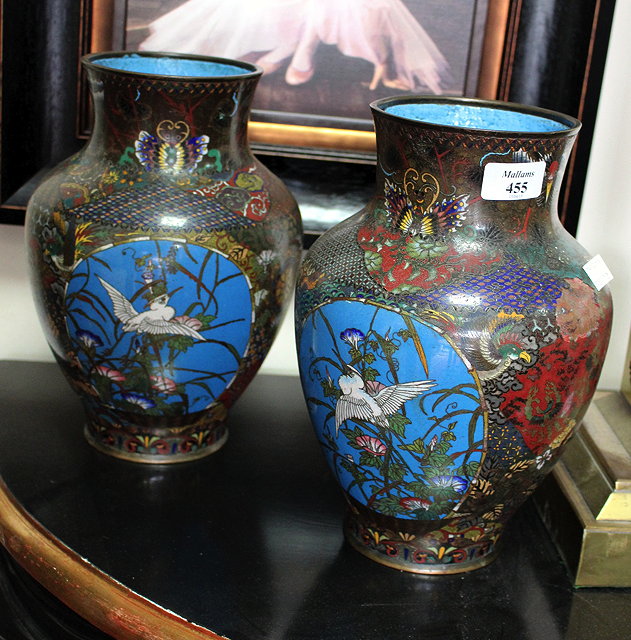 Appraisal: A PAIR OF JAPANESE CLOISONNE VASES decorated with a cartouche