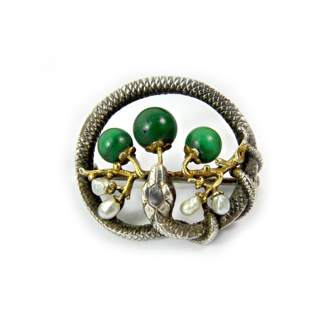 Appraisal: A silver serpent brooch late th century coiled with a