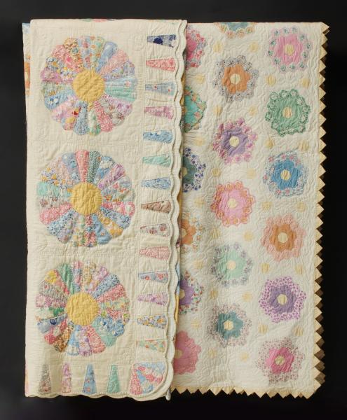 Appraisal: TWO VINTAGE FEEDSACK QUILTSThe two quilts in feedsack fabrics 'Grandmother's