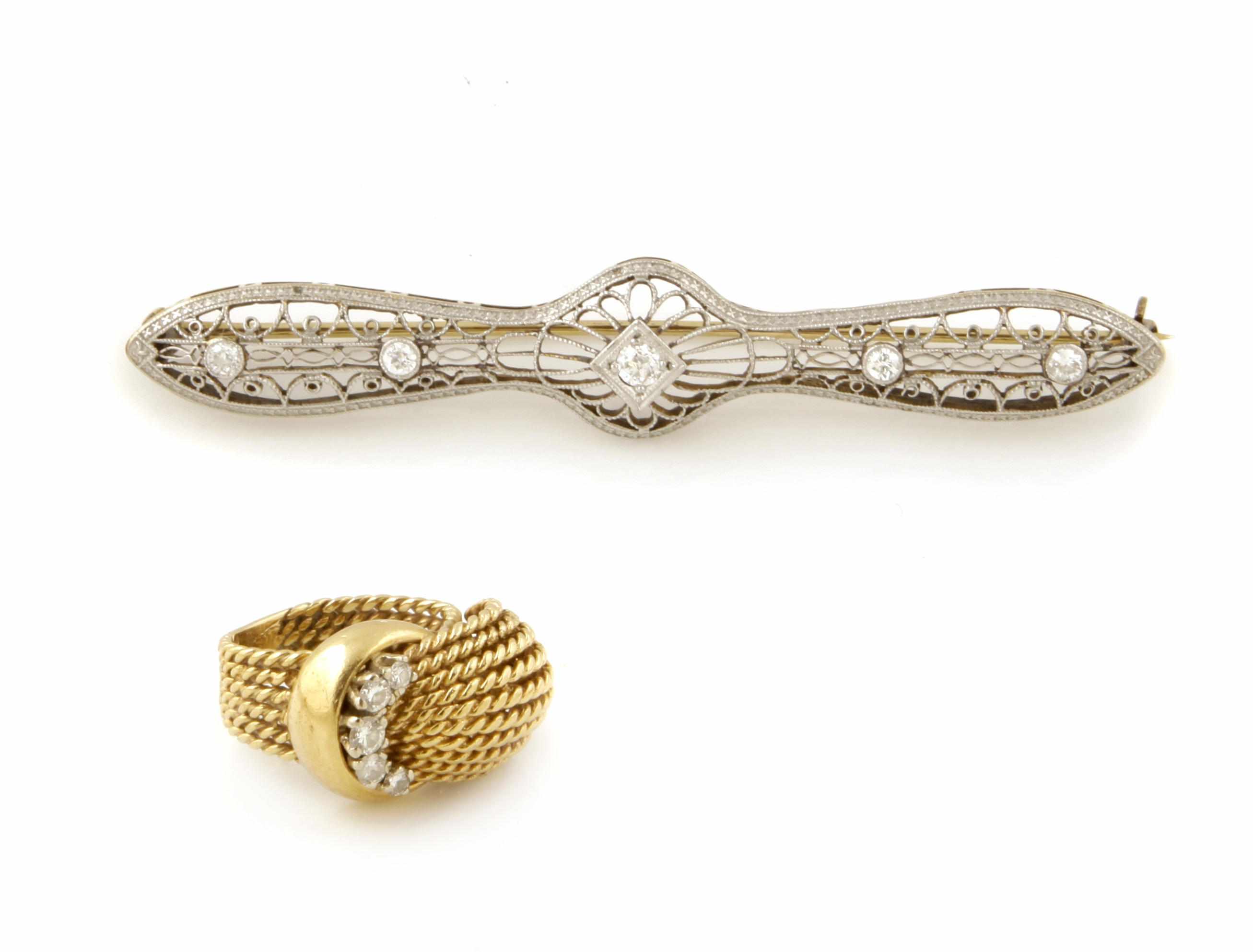 Appraisal: A diamond and platinum topped k gold bar brooch together