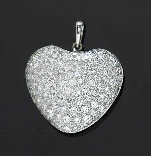 Appraisal: DIAMOND PENDANT White gold Classic convex heart-shaped pendant completely set