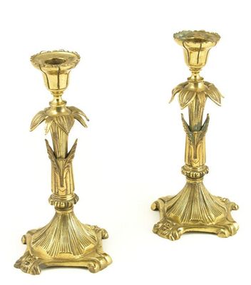 Appraisal: A pair of gilt brass candlesticks early th century in