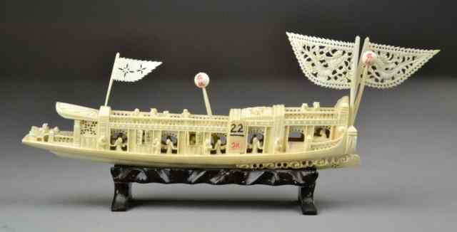 Appraisal: Chinese Carved Ivory Boat with FiguresIntricately carved ivory boat with