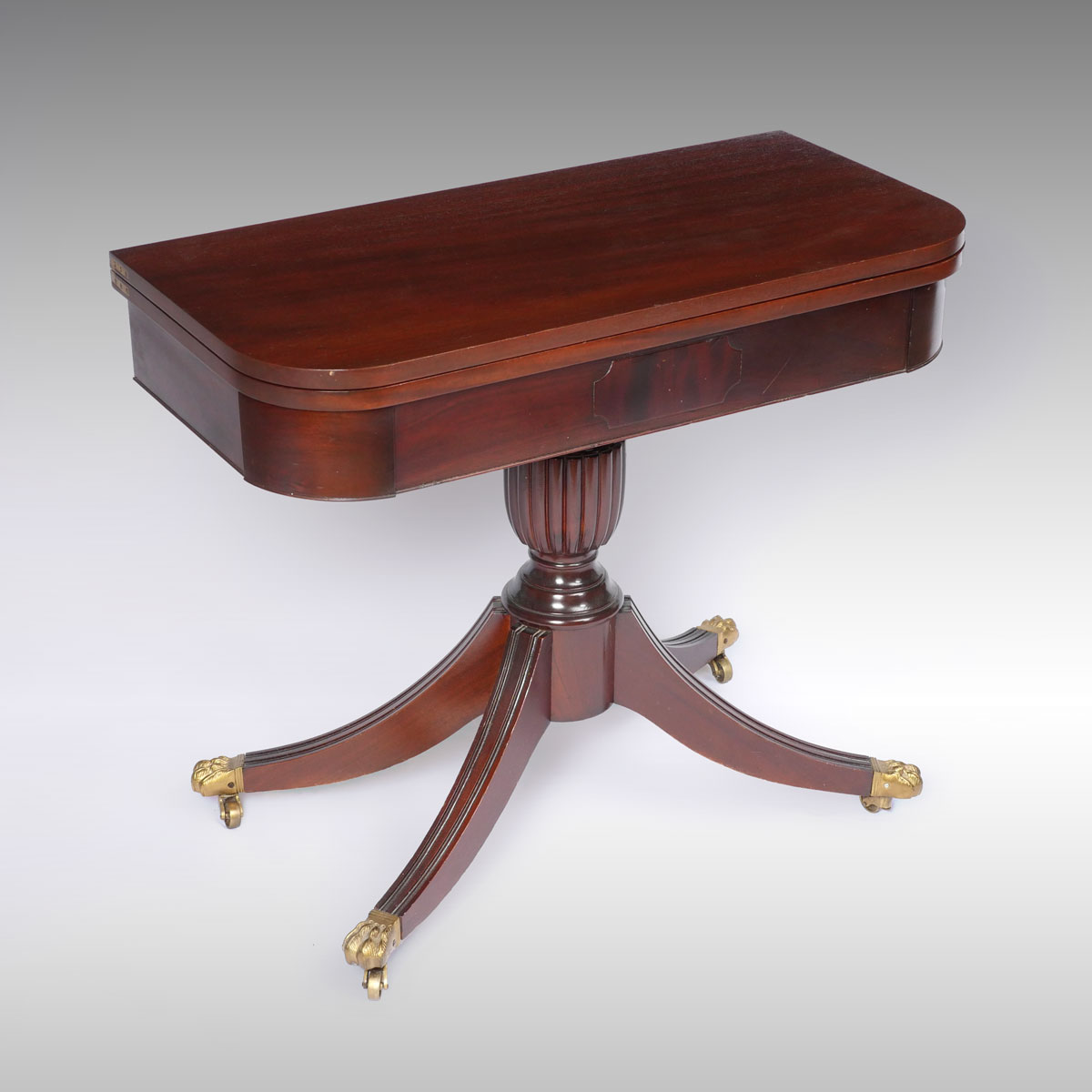 Appraisal: MAHOGANY GAME TABLE Game table with storage below surface Raised