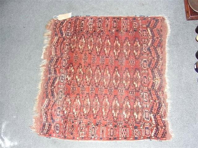 Appraisal: A BOKHARA RUG with four rows of elephant's foot design