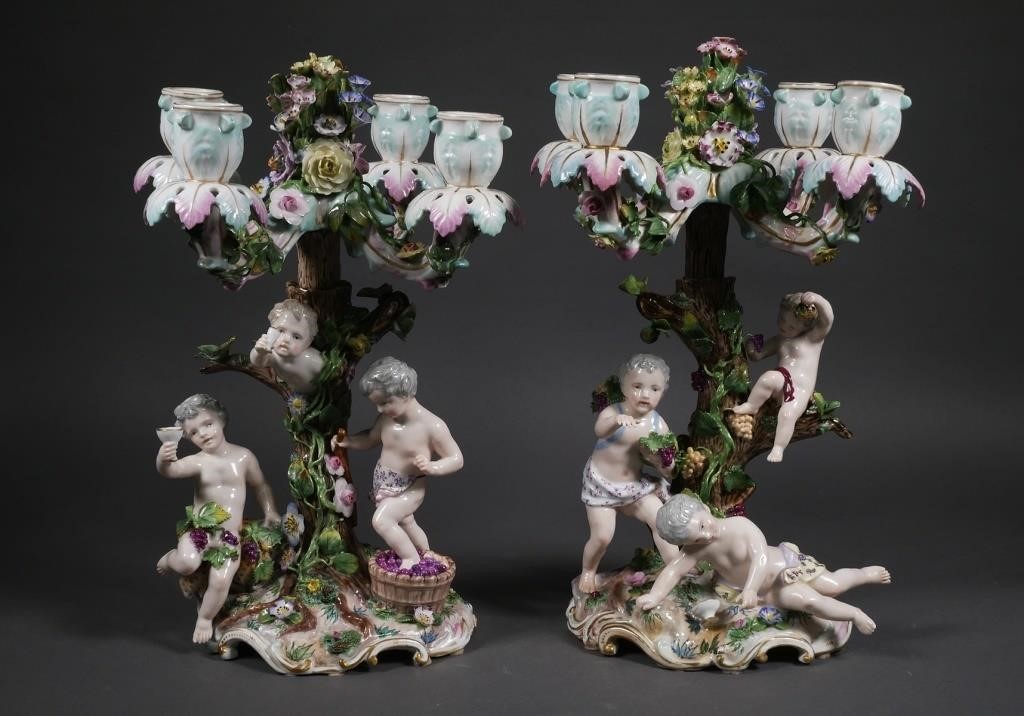 Appraisal: Pair of C four light figural candelabra featuring a group