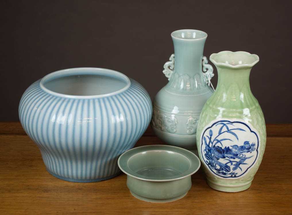 Appraisal: FOUR QING PORCELAIN VESSELS jar with blue glaze having vertical