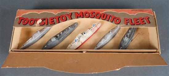 Appraisal: Tootsie toy painted slush metal five-piece mosquito fleet in original