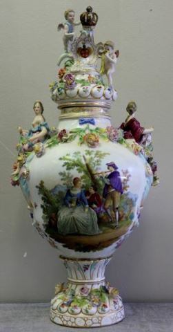 Appraisal: Carl Thieme Dresden Porcelain Lidded Urn Putti and crowned lid