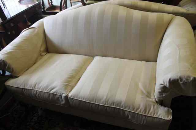 Appraisal: A PAIR OF WESLEY BARRELL GEORGIAN STYLE TWO SEATER SOFAS