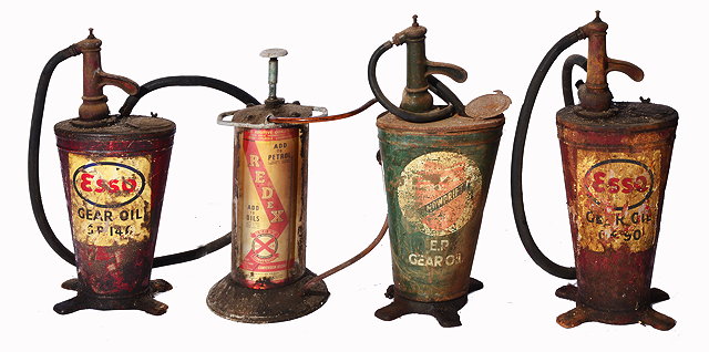 Appraisal: A GROUP OF FOUR GARAGE OIL PUMP CANS two painted