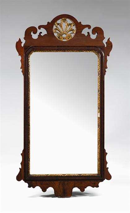 Appraisal: Mahogany Chippendale-style fret carved mirror Circular pierced gilt fan cresting