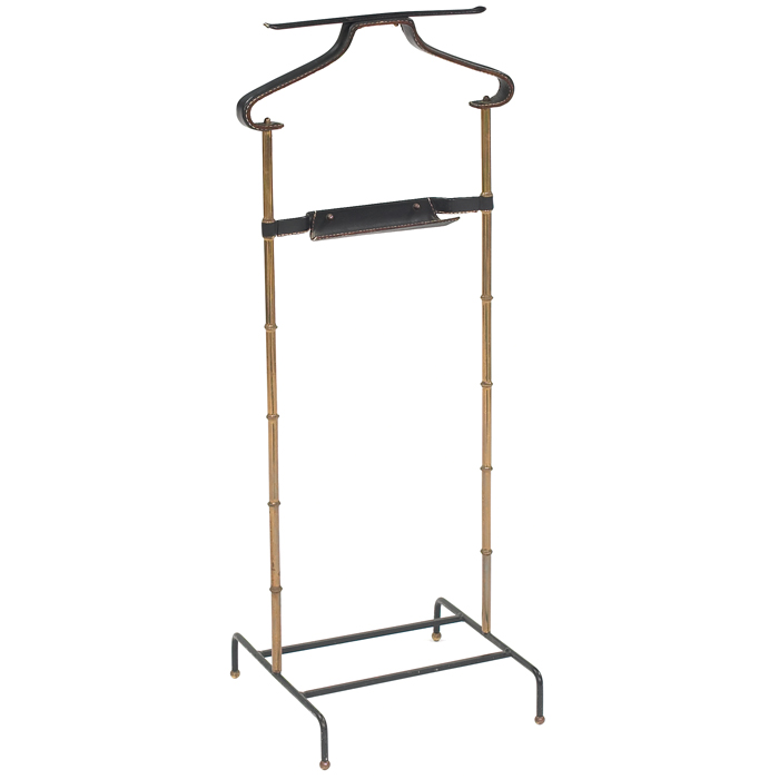 Appraisal: Jacques Adnet valet stand France s brass frame with original