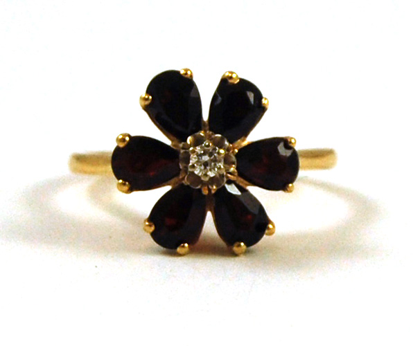 Appraisal: GARNET DIAMOND AND FOURTEEN KARAT GOLD RING with six pear-cut