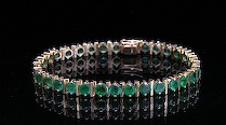 Appraisal: K Gold Emerald Link Bracelet Thirty two round cut natural