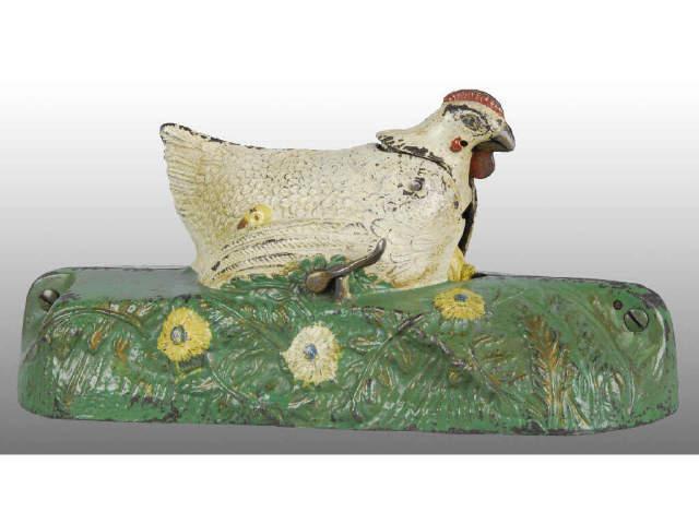 Appraisal: Cast Iron Hen and Chick Mechanical Bank Description Old repaint