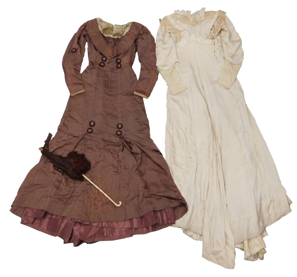 Appraisal: Two Victorian silk gowns and a parasol details include one