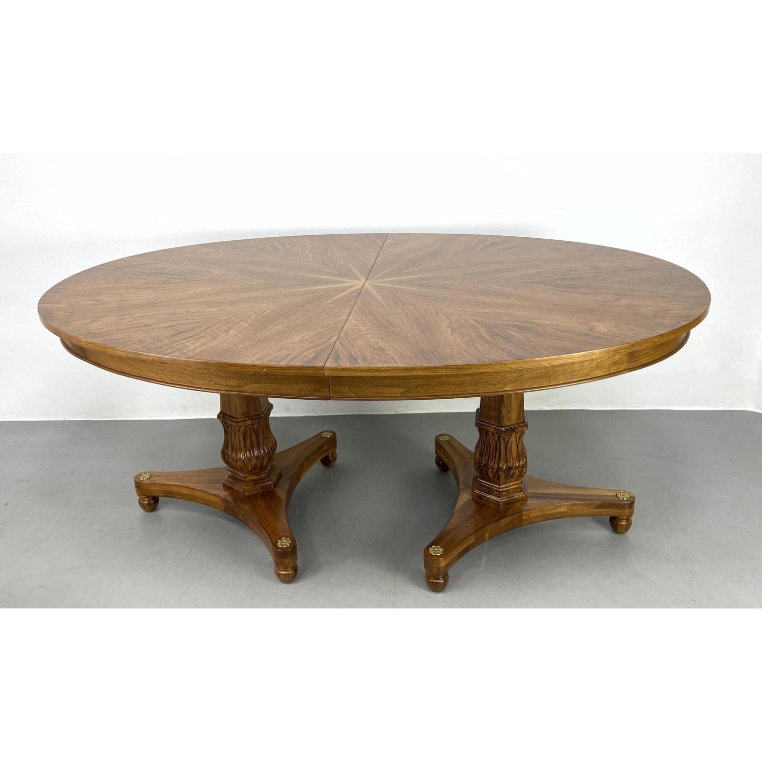 Appraisal: Double Pedestal Dining Table Star design top Carved bases with