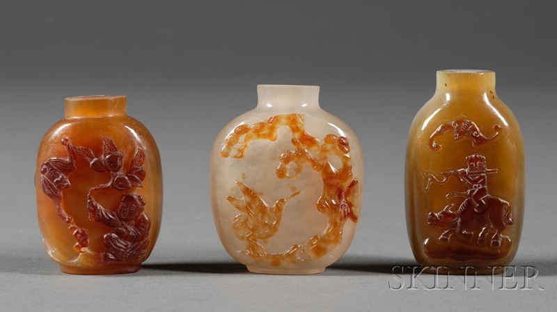 Appraisal: Three Shadow Agate Snuff Bottles a carving of a boy