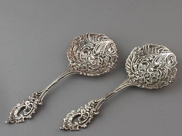 Appraisal: A pair of sterling reticulated serving spoons length in oz