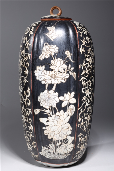 Appraisal: Chinese black ground porcelain vase with allover floral designs to