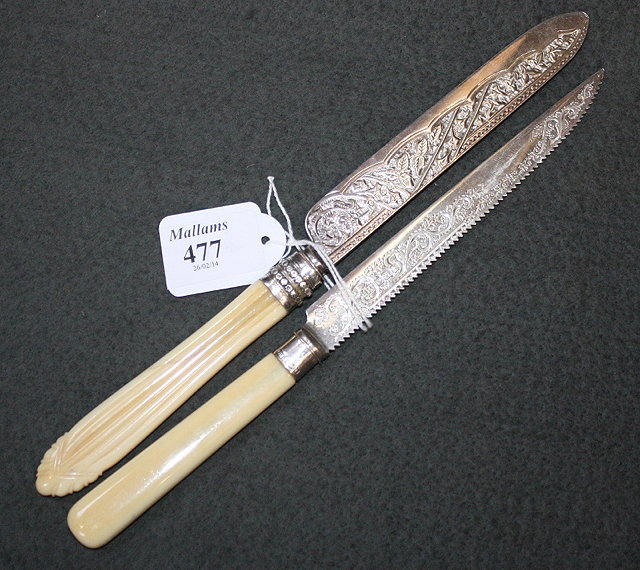 Appraisal: A VICTORIAN IVORY HANDLED AND SILVER BLADED CAKE KNIFE with