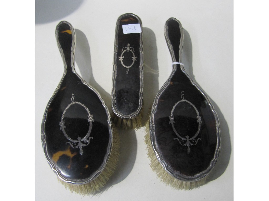 Appraisal: Three piece silver and tortoiseshell brush set Birmingham marks